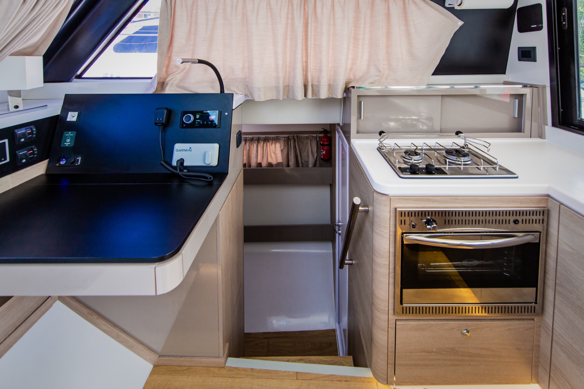 Aventura catamaran foredeck seating over turquoise water