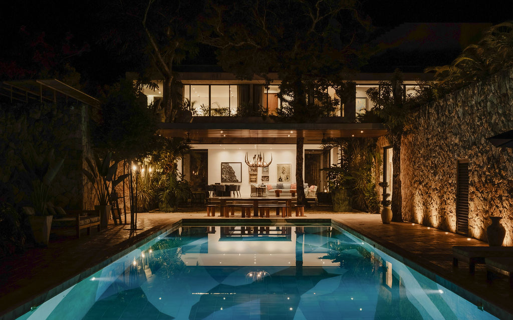 Casa Xolo at night — pool and jungle terrace
